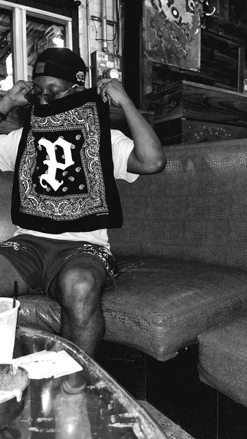 Black-and-white lifestyle photo of the Personal bandanna
